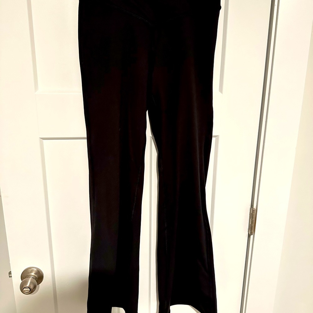 Avia flare bottom yoga pants. Black, size M with crossover waistband
